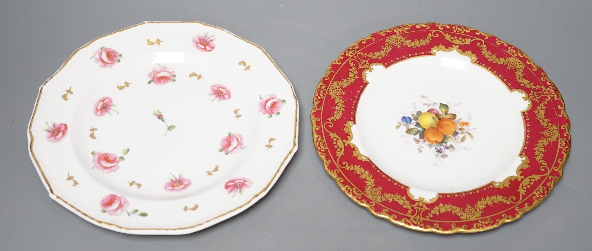 A Royal Crown Derby plate painted with fruit under claret ground by Cuthbert Gresley, signed, Made for Osler London, and a Derby King Street plate with roses